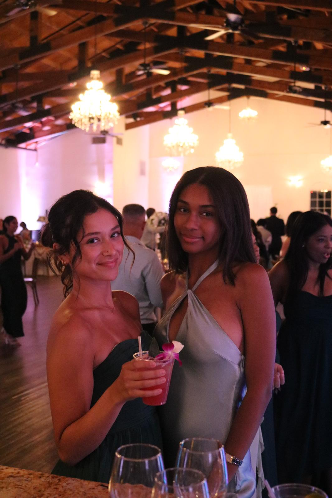 Guests enjoying cocktails at a wedding reception catered by Los Primos