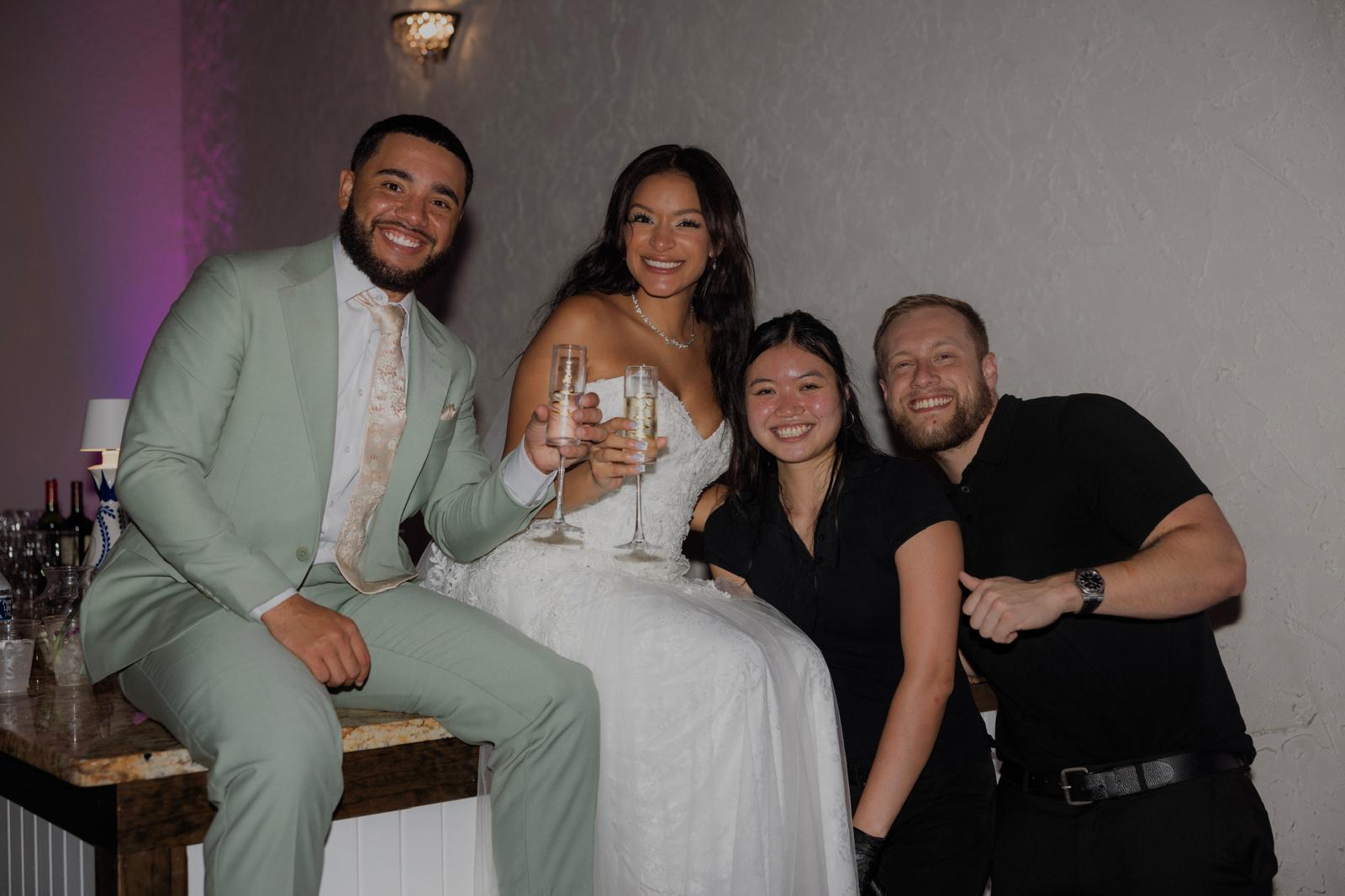 Wedding couple celebrating with the Los Primos events team